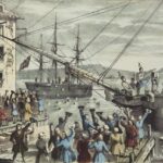 Hand-coloured print of men throwing tea chests from a ship into Boston Harbor as a crowd cheers.