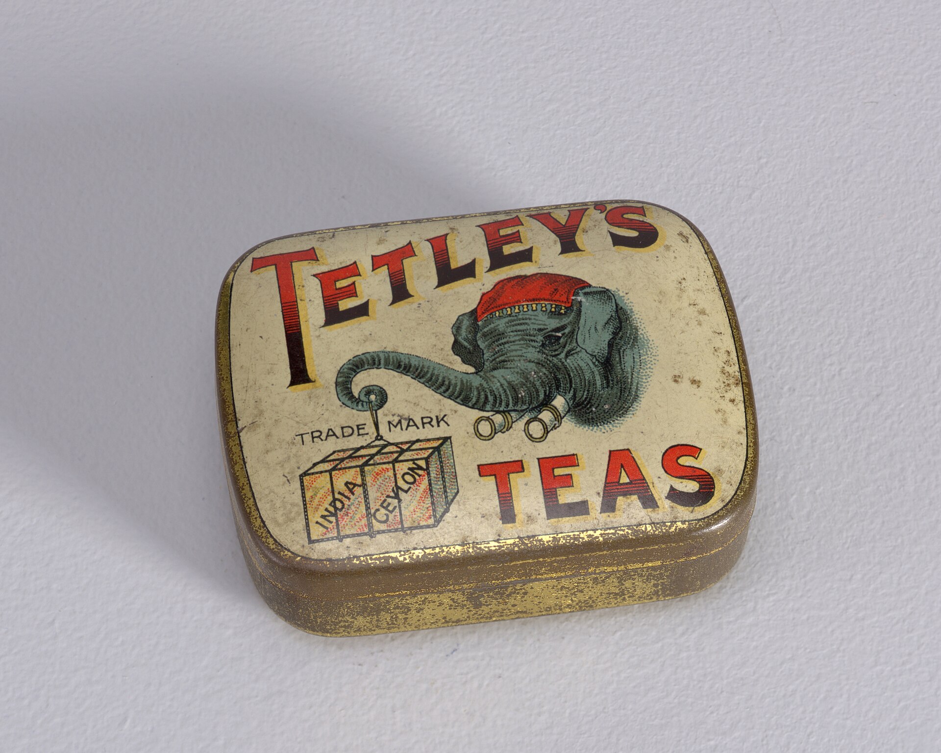 An old rectangular tin printed with 